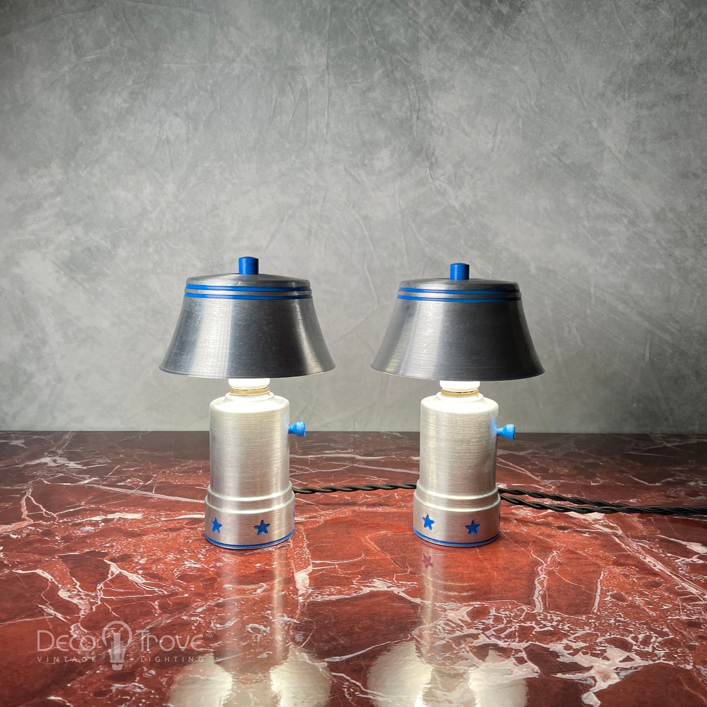 Pair of 1930s Alcoa Streamline Deco Aluminum and Enameled Blue Star Lamps